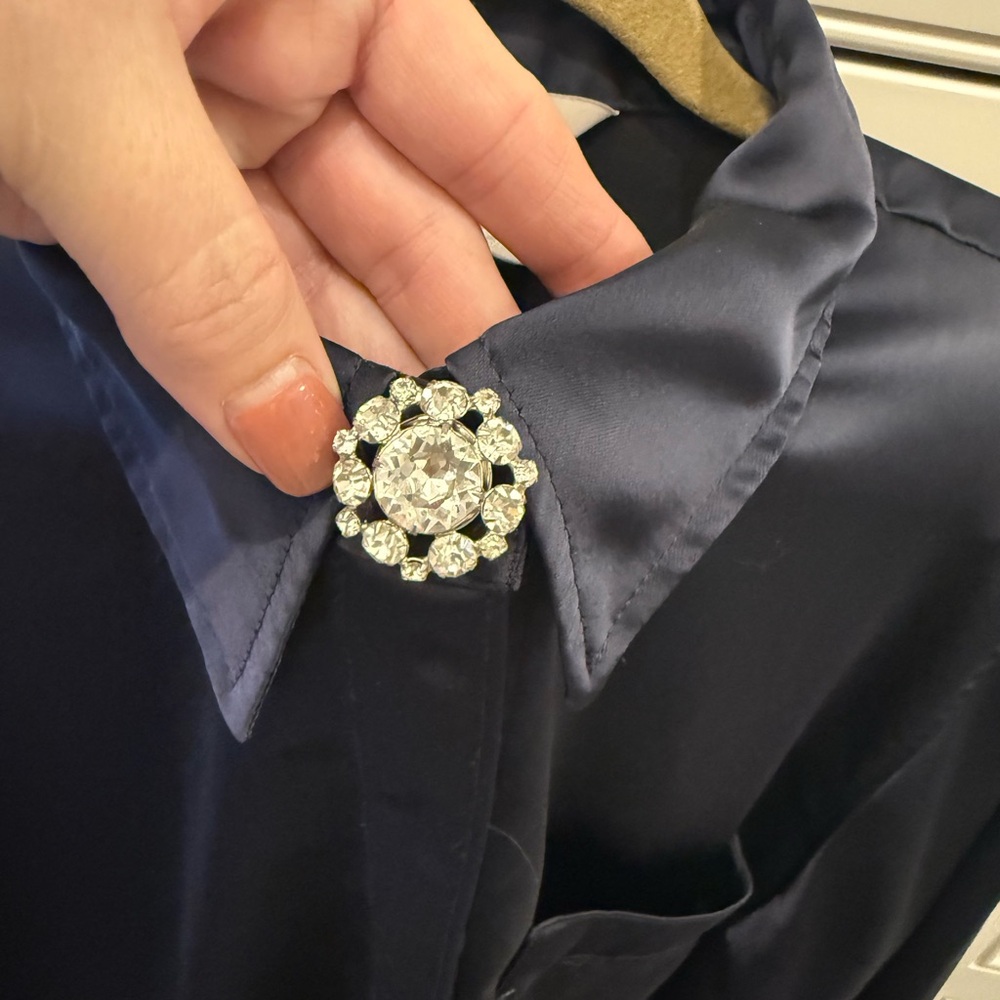 Vintage crystal earrings turned into button covers. Awesome accessories